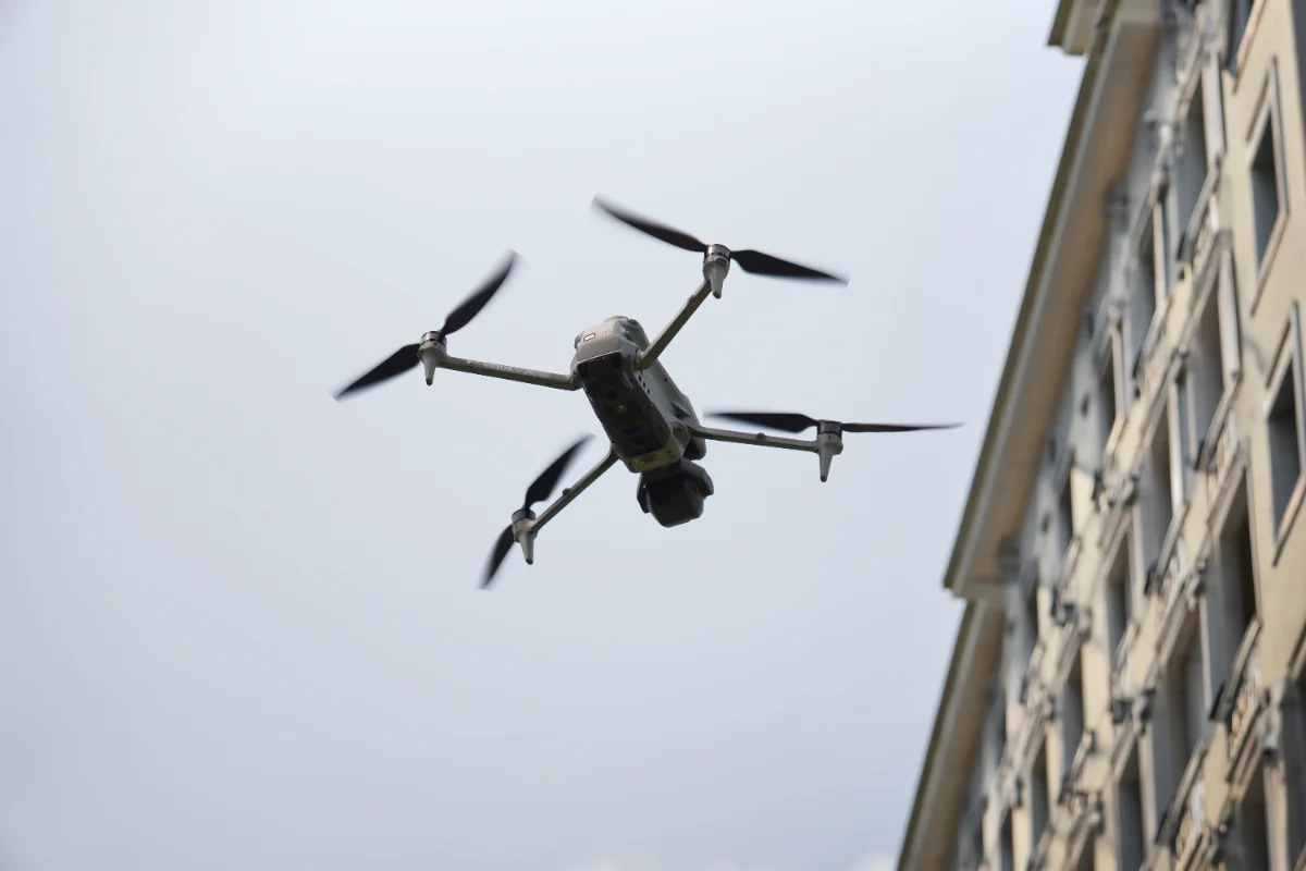 Drone inspecting a high-rise facade in Singapore